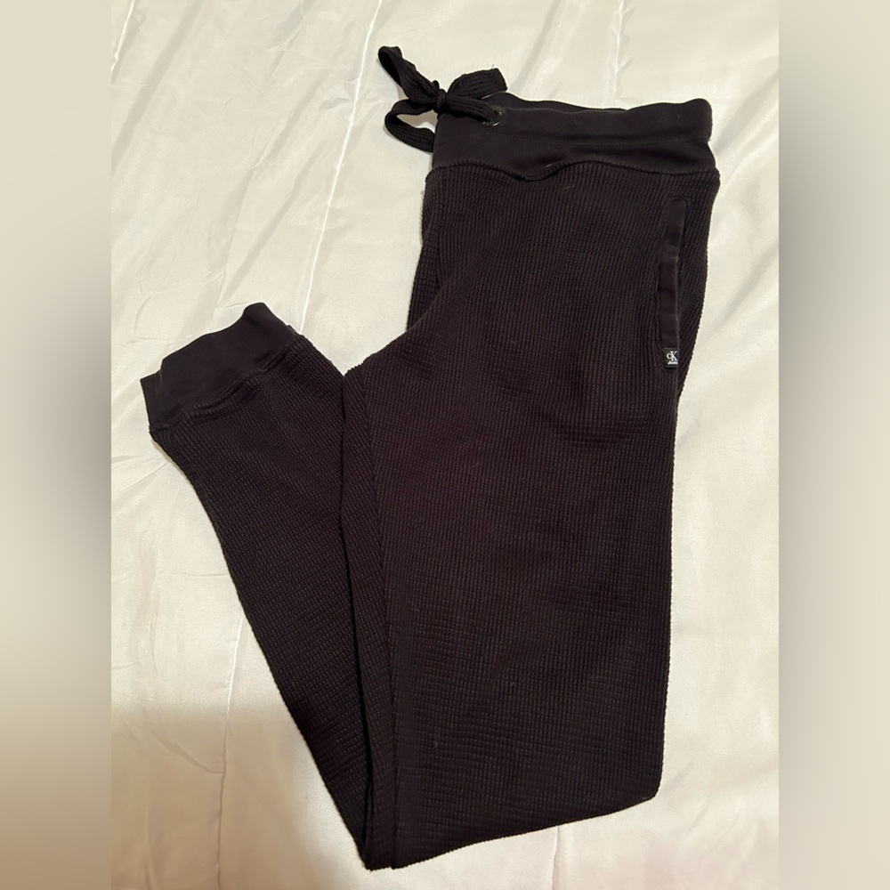 Calvin Klein Jeans black waffle joggers I great condition. Size medium.